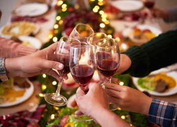 Group of people toasting for Christmas