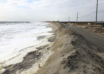 Waters rise to the Dune Road berm on Saturday, December 14, 2019