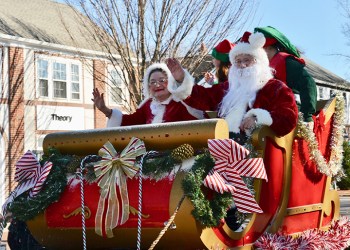 Mrs. Claus (Juliette Parker) and Santa (Dan Rattiner) leading the 2018 East Hampton Santa Parade,