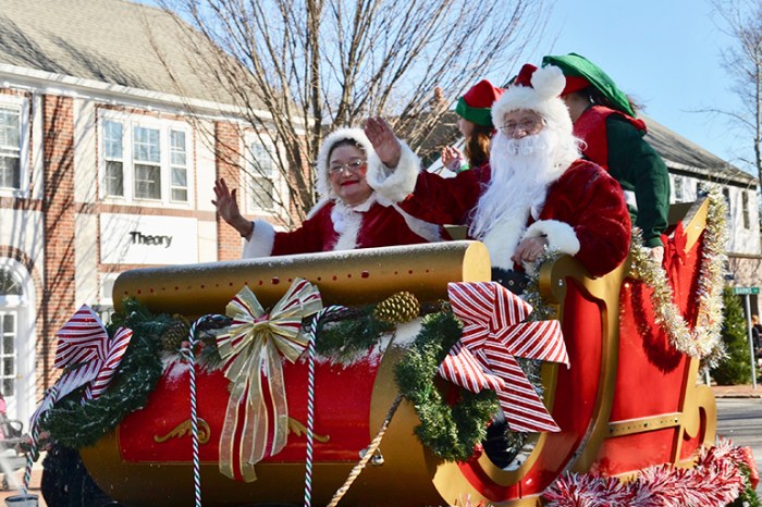 Mrs. Claus (Juliette Parker) and Santa (Dan Rattiner) leading the 2018 East Hampton Santa Parade,