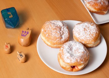 Sufganiyot- Hanukkah Doughnuts and dreidels.