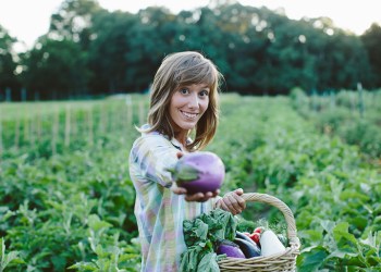 ­­Cristina Cosentino presenting vegetables from Sylvester Manor Educational Farm