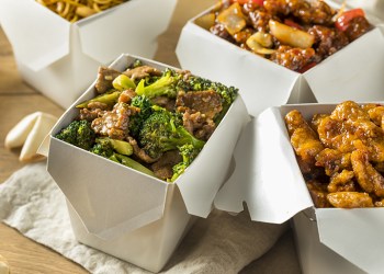 Spicy Chinese Take Out Food with Chopsticks and Fortune Cookies