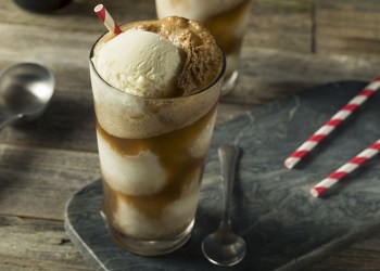 Homemade Soda Black Cow Ice Cream Float with a Straw