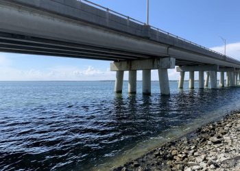 AFTER LAUNCHING FROM THE BOAT RAMP BY THE PONQUOGUE BRIDGE, TWO MEN FROM QUEENS HAD TO BE RESCUED FROM THE WATER WHEN THEIR BOAT OVERTURNED SUNDAY. PHOTO BYTAYLOR K. VECSEY