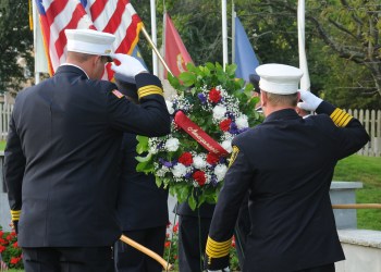 FIRE CHIEFS SALUTE AT THE EAST HAMPTON 9/11 MEMORIAL IN 2019. PHOTO BYRICHARD LEWIN