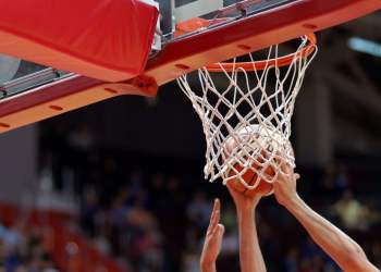 Fight under the backboard during a basketball match