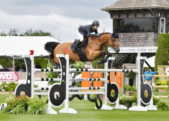 Adrienne Sternlicht and Fantast, winners of the $30,000 Land Rover Jumper Challenge opening day at the Hampton Classic Horse Show  Shawn McMillen