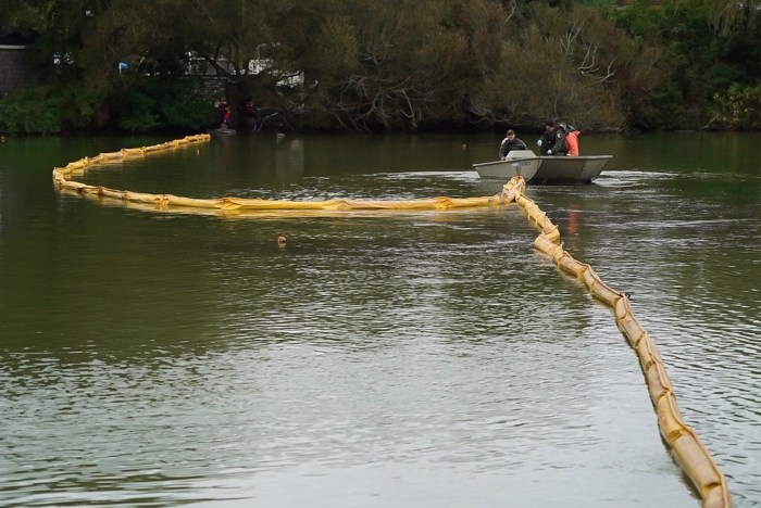 A mobile harvester system to filter algae out of the water has been installed in Southampton Village’s Lake Agawam. Independent/Courtesy Gov. Andrew Cuomo’s office