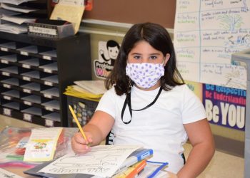 Despite mask mandate Riverhead Central School District students were all smiles on the first day of school, even behind their masks.