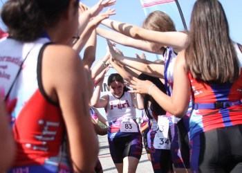 i-Tri Girls competing in the triathlon were met by their peers at the finish line.