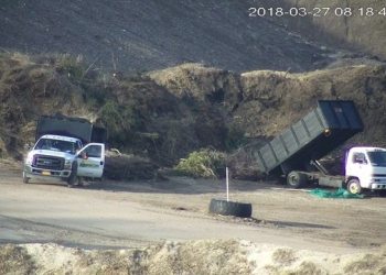 GEE and CCE (Environmental operatives say theyve captured photos of illegal operations continuing at the Sand Land mine in Noyac.)