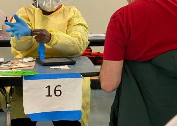 Everyone was given a number in the carefully organized cafeteria-turned-vaccination room.