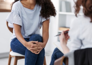 Anonymous photo of two women during group psychotherapy for people with depression