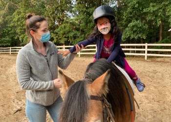 Kathryn riding Pumpkin alongside volunteers Jackie, Tom and Anne Courtesy CTREE