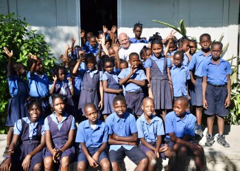 Jonathan Nash Glynn with Wings Over Haiti students