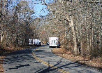 Suffolk County police keep watch over the area in Manorville where skeletal remains were found on Friday, Feb. 17 2012