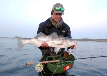 Tim Regan, aka South Fork Salt, shows off a striper