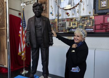 Vicki Schneps poses for a photo with a newly unveiled statue of former Queens Borough President Claire Shulman on Thursday, Oct. 7, 2021.