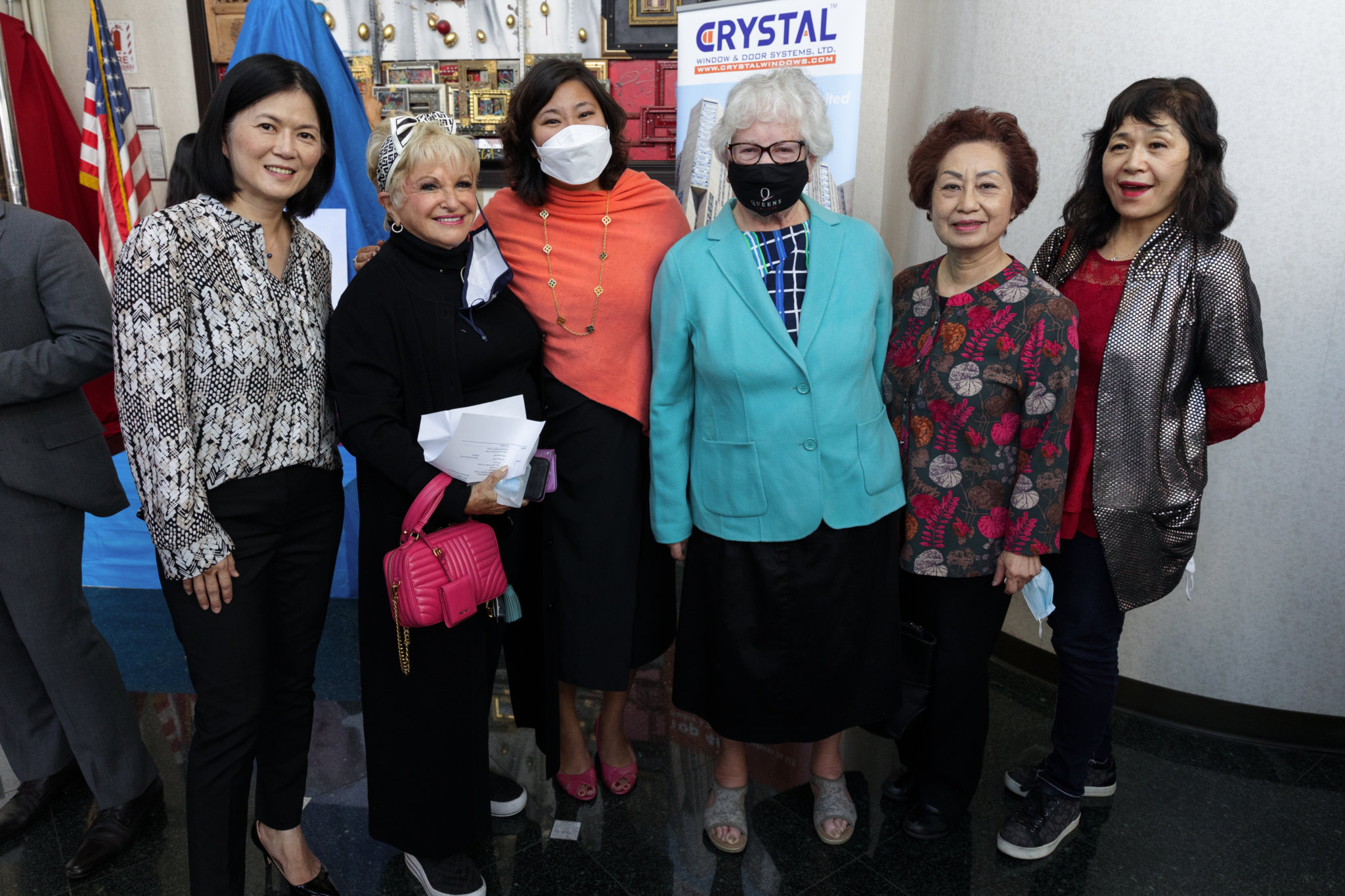 From left: Cathy Hung, Vicki Schneps, Grace Meng, Toby Stavisky, Pauline Chu and Li Su pose for a photo during the former Queens Borough President Claire Shulman statue unveiling on Thursday, Oct. 7, 2021.