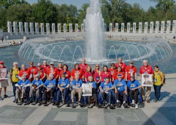 Nine World War II Veterans, their Guardians and Honor Flight Long Island officials at the Washington, D.C. World War II memorial on October 3 nonprofits