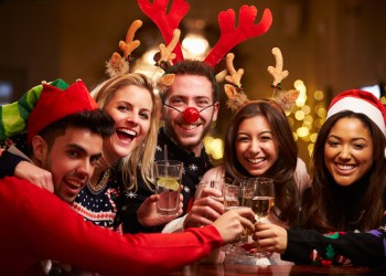 Multicultural friends can gather at the Holiday Hop Bar Crawl in Riverhead