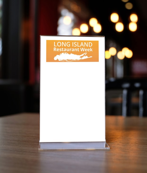 Mock up Menu frame standing on wood table in Bar restaurant cafe. space for text with Long Island Restaurant Week logo Hamptons