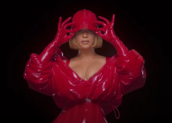 Beyonce shows off faux latex gear in her IVY Heart campaign video