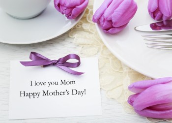 Mother's day card with table setting with purple tulips