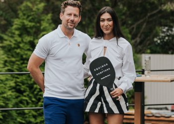 Trisha Goyal with special guest Wim Fissette, international tennis coach, at the Break the Love Equinox x Hamptons kickoff event