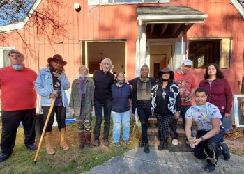 Ma's House with friends, family and Shinnecock founding artist Jeremy Dennis (kneeling) Courtesy Christian Weaver