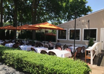 Outdoor tables at Dopo Il Ponte in Bridgehampton