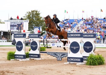 Georgina Bloomberg and her horse Tulara Colmine jump at the 2021 Hampton Classic in Bridgehampton