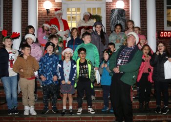 4th and 5th grade children sing Christmas carols before the tree lighting