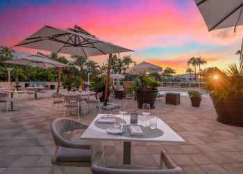 Dining by the pool at the Ambassador Hotel and Residences in Palm Beach