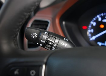 Closeup image of car lighting control switch blinker left turn signal