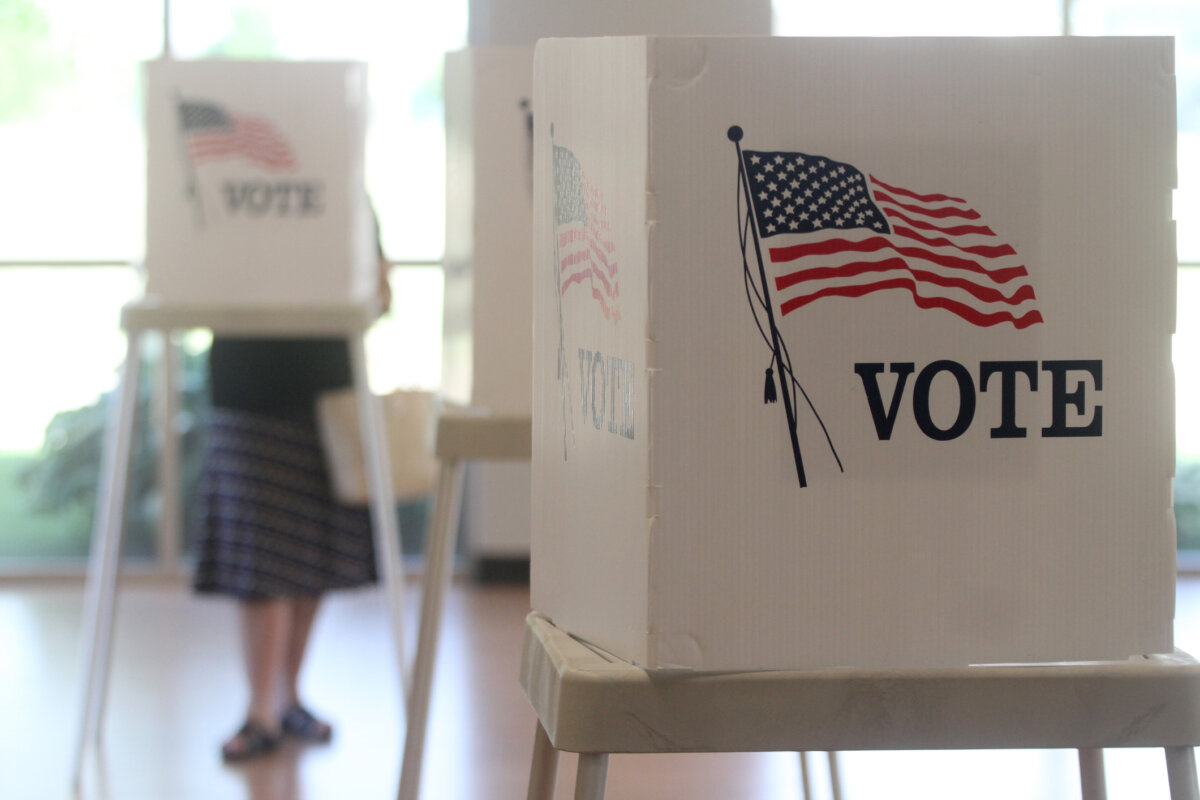 Voting booths stand ready for use in a U.S. election. Early voting starts soon