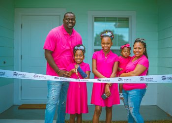 New Habitat Homeowners, Jerrod James & Iesha James with their children at the Habitat for Humanity Giving of Keys Celebration