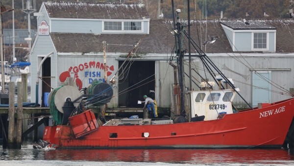 Photo of a man and the fishing vessel New Age, taken from surveillance footage in Montauk