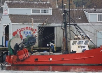 Photo of a man and the fishing vessel New Age, taken from surveillance footage in Montauk