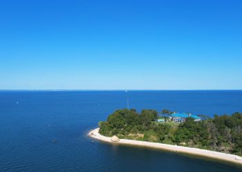 A home with 20,000 square feet of living space sits on a 10-acre peninsula on Crane Neck Point in Old Field.