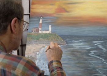 Vietnam veteran John Melillo painting his new Lighthouse for Hampton Fine Art Fair 2023