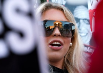 Former Zeldin intern Isabella DeLuca, of Long Island, N.Y., appears outside the Supreme Court, Oct. 26, 2020, on Capitol Hill in Washington. (AP Photo/Jacquelyn Martin, File