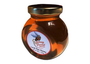 An 8 oz jar of Honey Rocket Apiaries honey