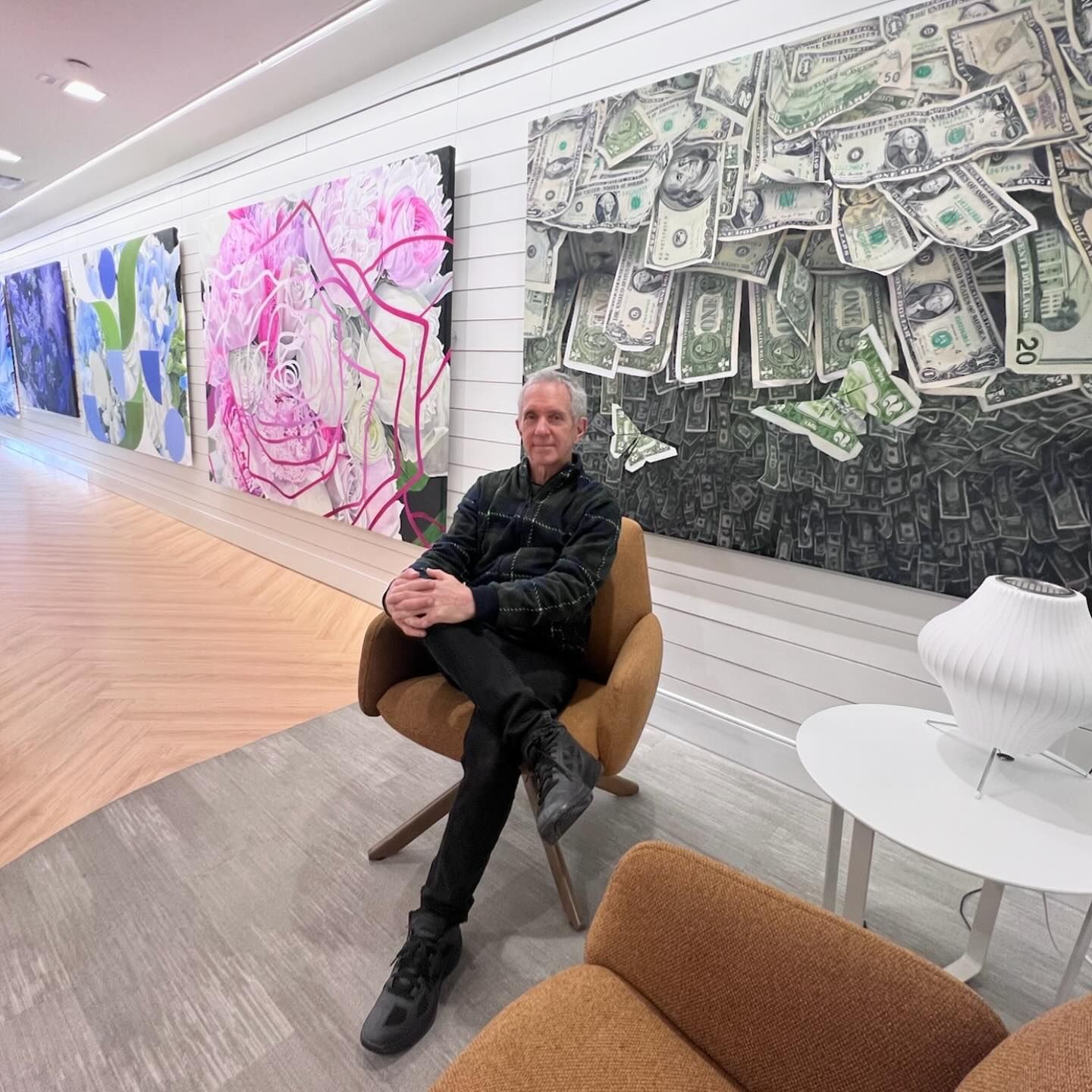 Charles Wildbank at M&T Bank in Westhampton Beach, where East End Arts has arranged an exhibition of his large-scale abstract photorealism paintings.