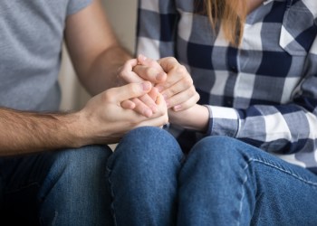 Married couple holding hands giving psychological support, being friend, help trust empathy hope in marriage, care understanding in relationships, comfort and reconciliation concept, close up view