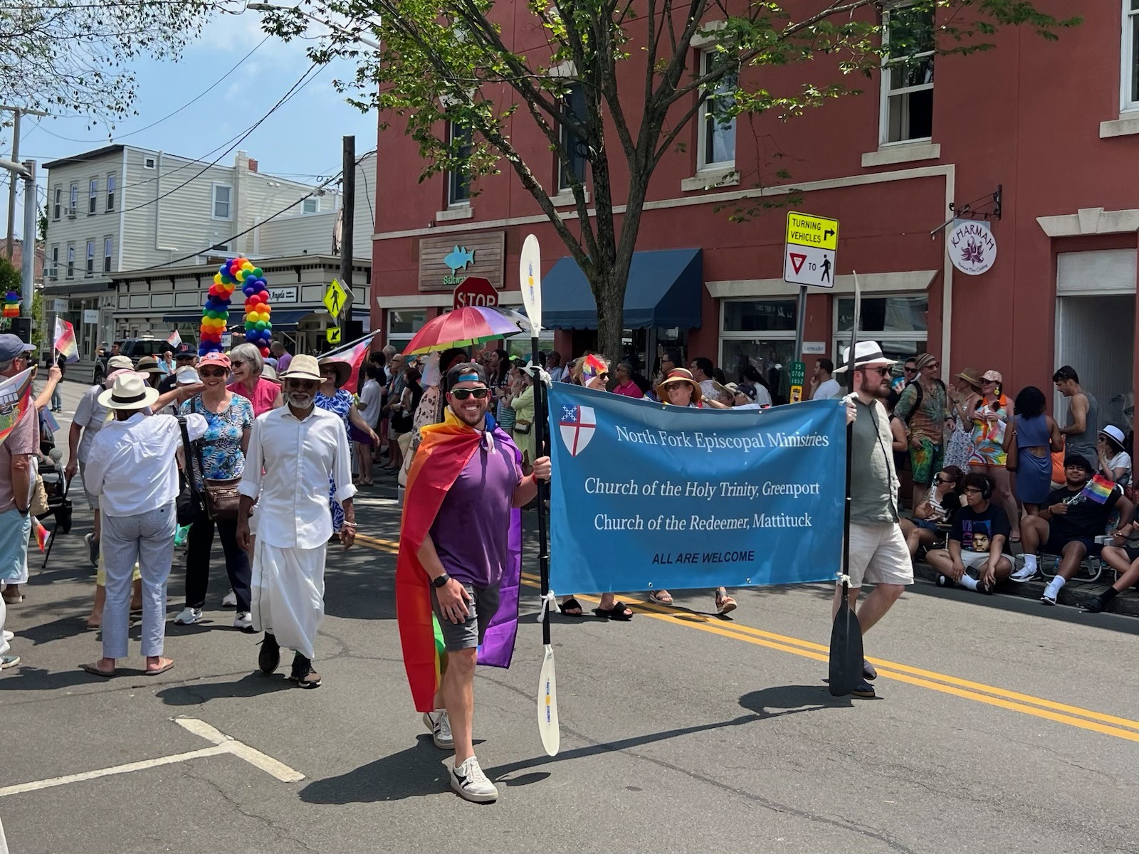 Brian Quillin walking with the North Fork Episcopal Ministries churches in the 2024 North Fork Pride Parade