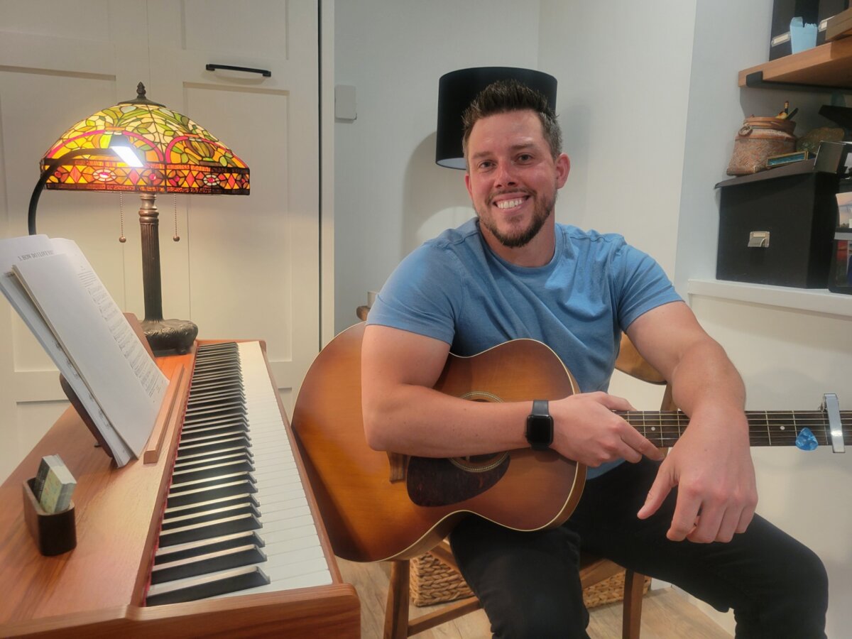 Brian Quillin in his interim teaching space, which his Greenport neighbors graciously offered to him while his apartment is remodeled.