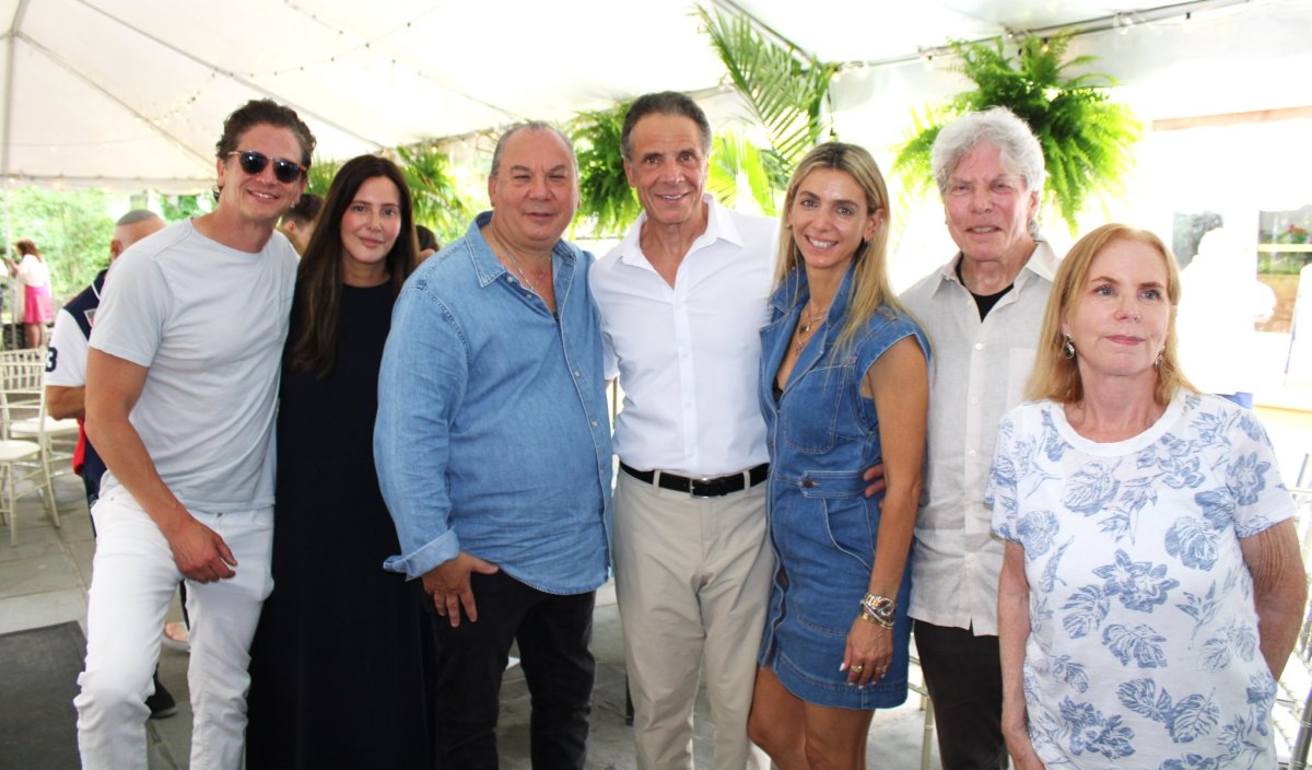 Ari Ackerman, Stephanie Knepper Basman, Rabbi Marc Schneier, Andrew Cuomo, Simi Teitelbaum Schneier, Ken Sunshine, Dr. Nancy Hollander at the Hampton Synagogue