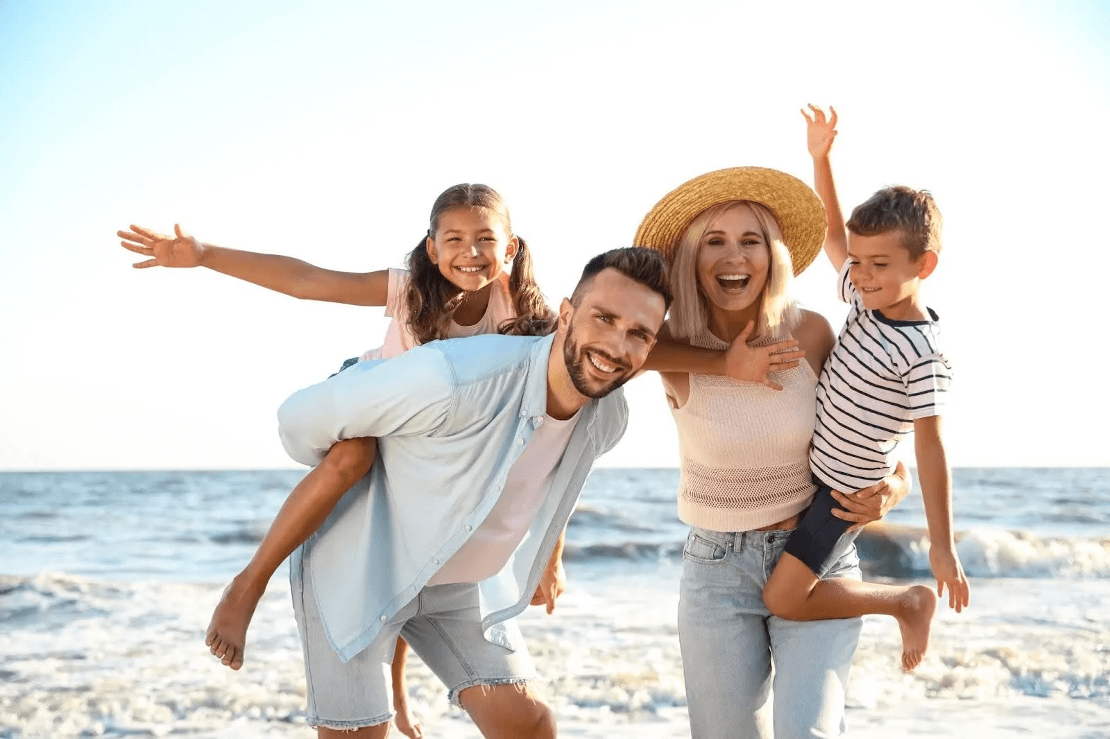 Family on beach moving with Suburban Jungle